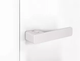 The picture shows the mounted Door handle One in White on a white door.